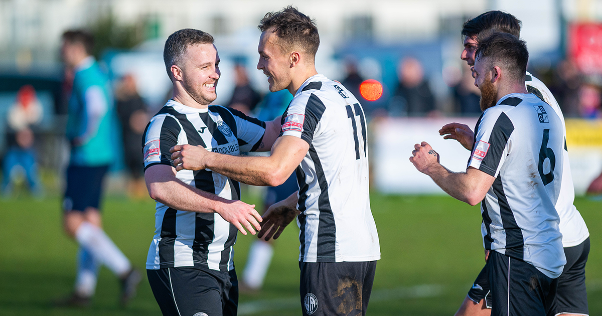 WEB San Mulready congratulates Toby Hilliard (right) on his opening goal WEB San Mulready congratulates Toby Hilliard (right) on his opening goal